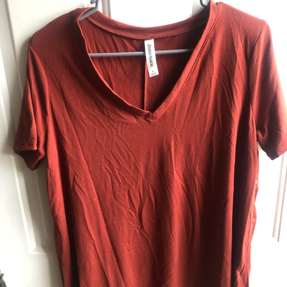 Rust colored V neck shirt